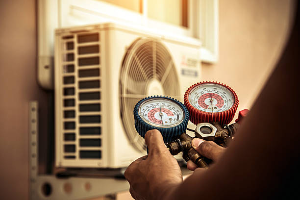 Professional Hvac technician working in Wayland, MA